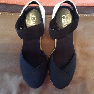 Chaps wedges with stretchy part over foot.